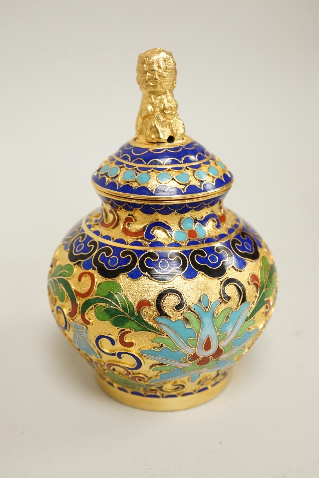 A collection of miniature enamel and cloisonné boxes, eggs and a painted rabbit, etc. (11)